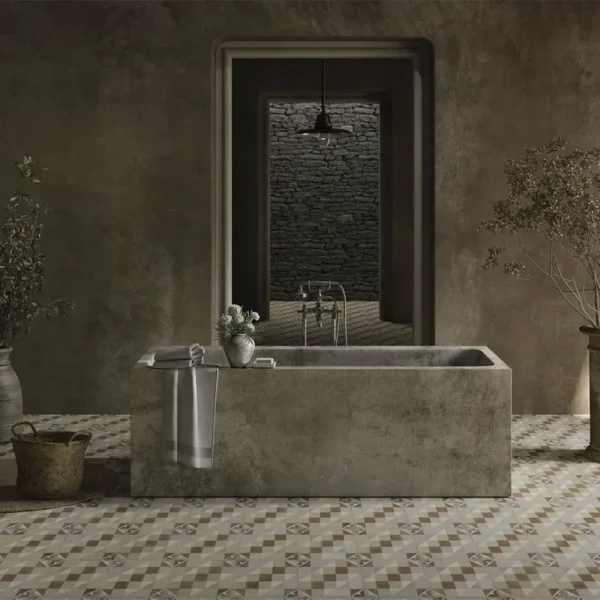 Estética vintage con suelo de azulejos hidráulicos y bañera visible