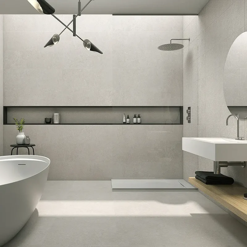 Alicatado baño moderno junto al lavabo suspendido