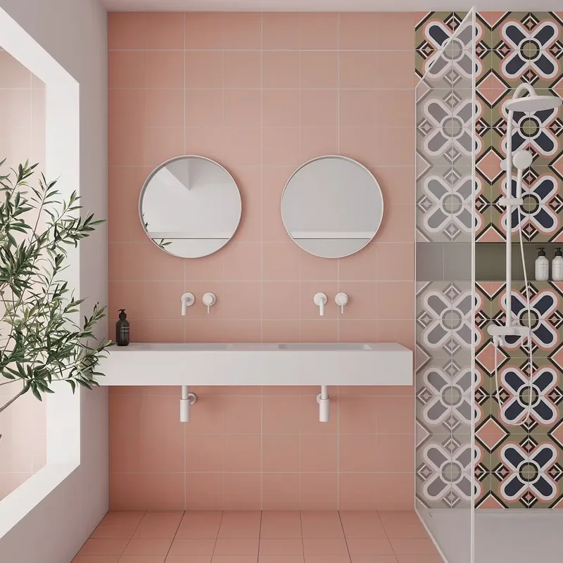 Espacio con encanto retro decorado con azulejos hidráulicos en la ducha