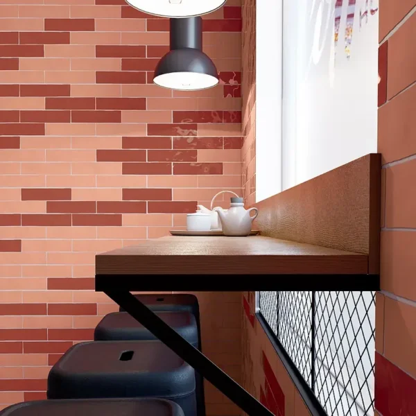 Estética dinámica creada con azulejo color rojo en toda la superficie