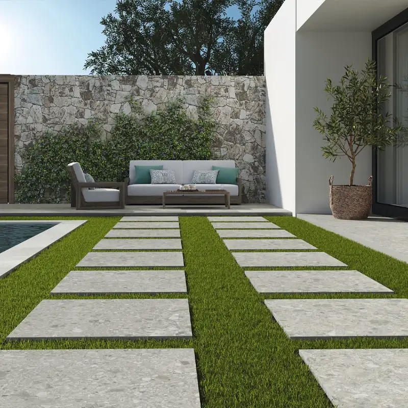 Superficie uniforme creada con azulejos para patios modernos en disposición regular