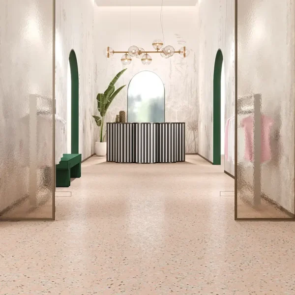 Fragmentos de color y forma se combinan en el gres porcelánico imitación terrazo con naturalidad