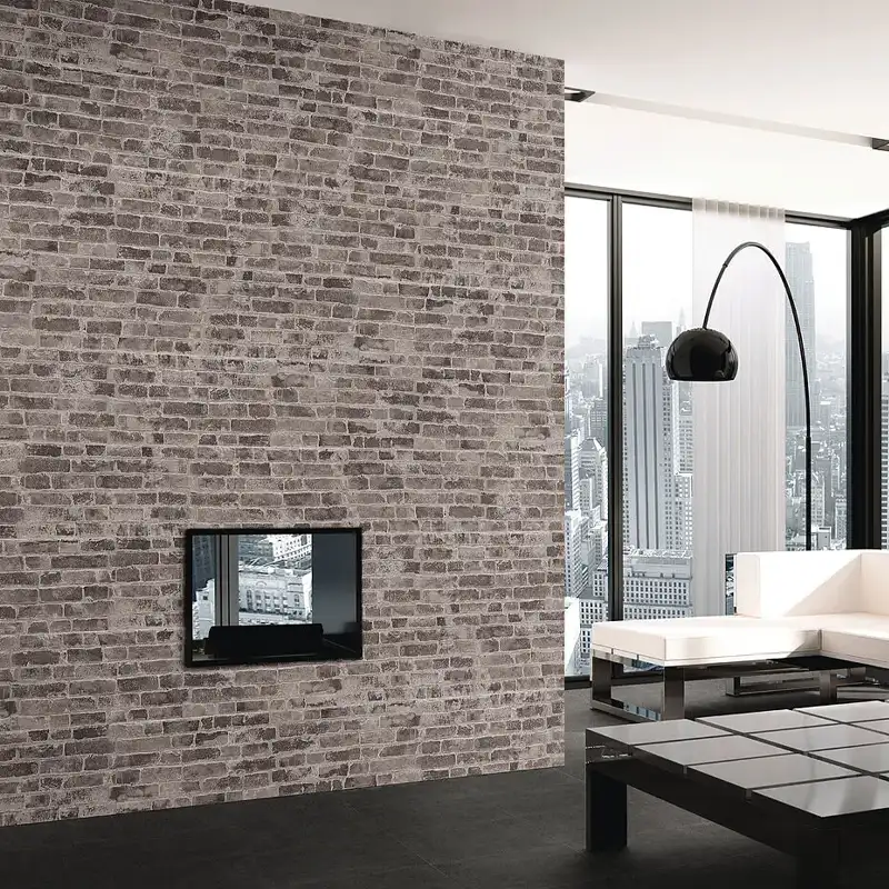 Azulejo imitación ladrillo gris utilizado como recurso decorativo de gran impacto