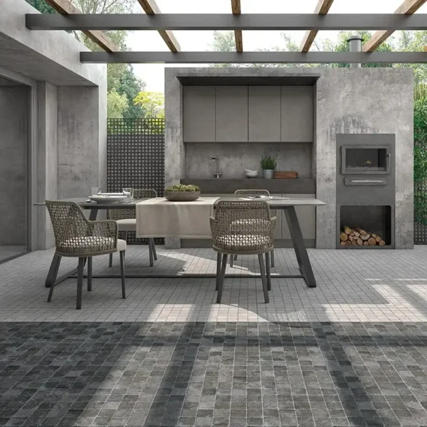 combinación sofisticada entre tonos claros y porcelanico gris oscuro en el suelo